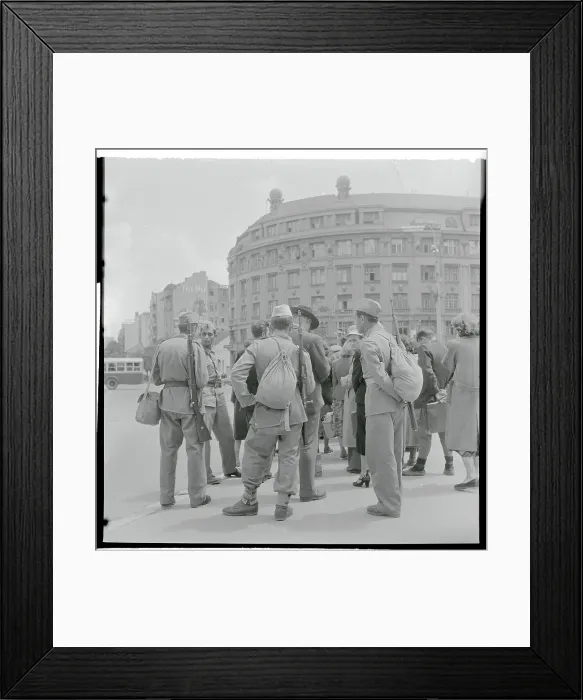 Framed Print : Infantrymen and Local Citizens Waiting at a Bus Stop Framed Print : Infantrymen and Local Citizens Waiting at a Bus Stop