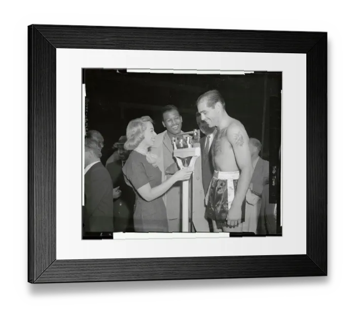 Framed Print : Carl Olson Being Weighed by Joyce Brothers Framed Print : Carl Olson Being Weighed by Joyce Brothers