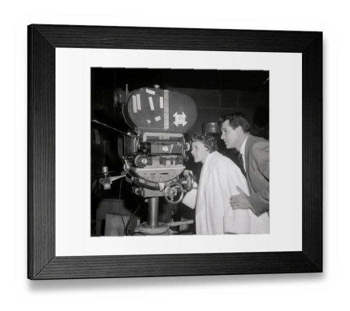 Framed Print : Rock Hudson and Phyllis Gates with Movie Camera Framed Print : Rock Hudson and Phyllis Gates with Movie Camera