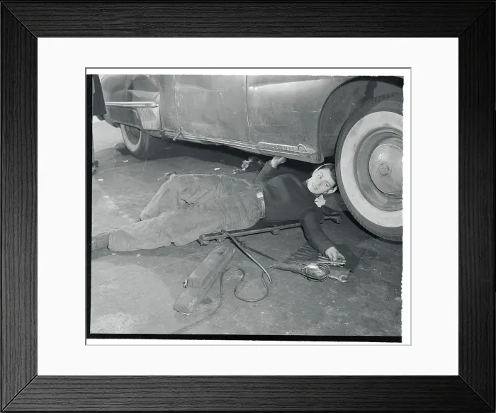 Framed Print : Doris Lang Working on a Car Framed Print : Doris Lang Working on a Car