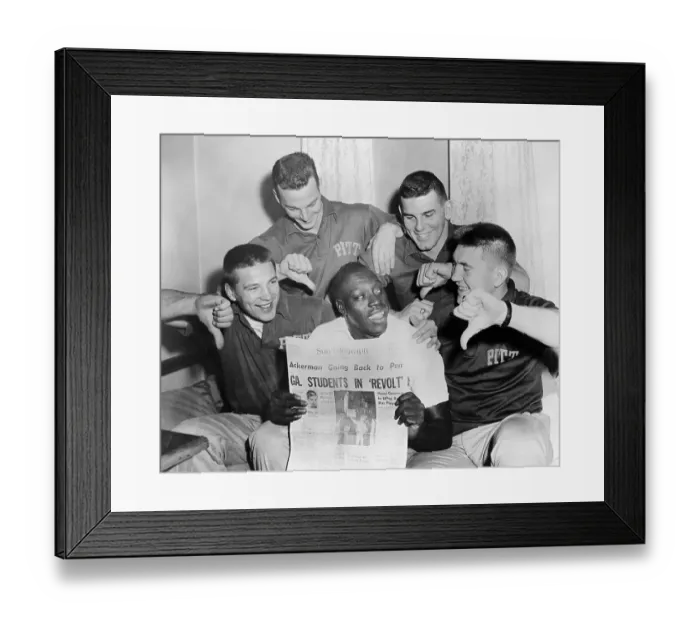 Framed Print : Bobby Grier Holding Newspaper on His Team's Protests