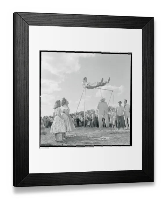 Framed Print : William Holden Performing on the Horizontal Bars Framed Print : William Holden Performing on the Horizontal Bars