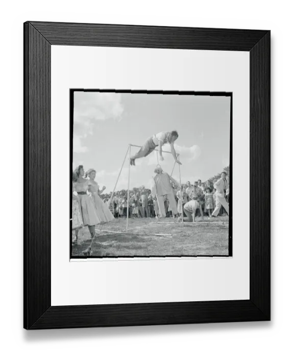 Framed Print : William Holden Performing on the Horizontal Bars Framed Print : William Holden Performing on the Horizontal Bars