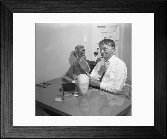 Framed Print : Edgar Bergen Trying on Toupee Framed Print : Edgar Bergen Trying on Toupee