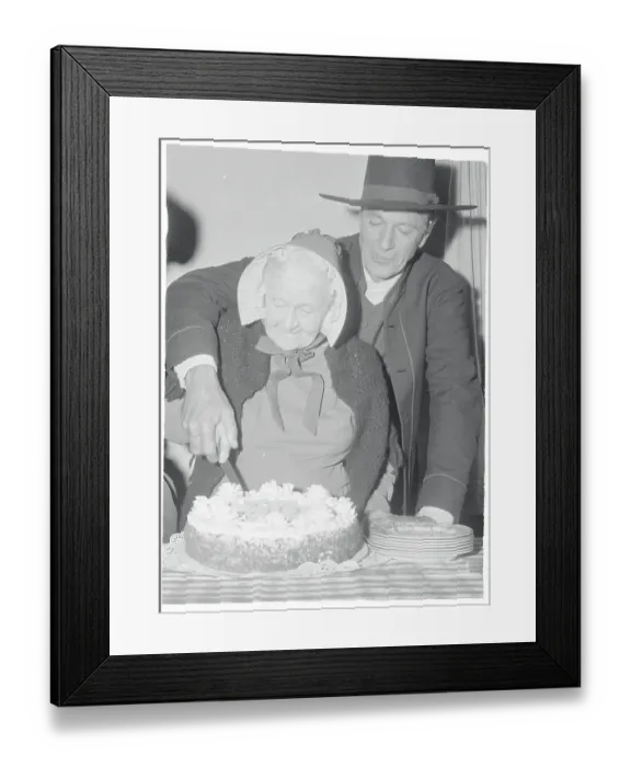 Framed Print : Gary Cooper Helping Mary Carr Cut a Cake Framed Print : Gary Cooper Helping Mary Carr Cut a Cake
