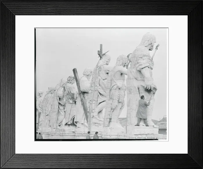 Framed Print : Man Cleaning Apostle Statues