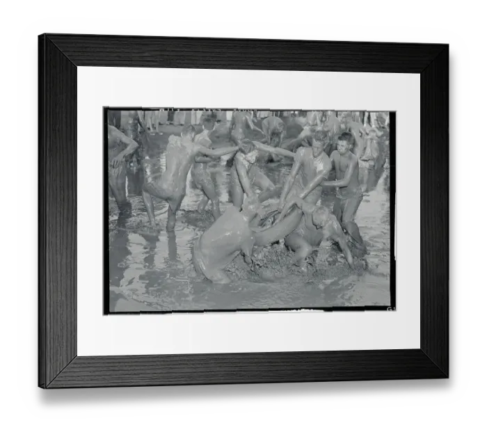 Framed Print : Football Players Wrestling in Mud Framed Print : Football Players Wrestling in Mud