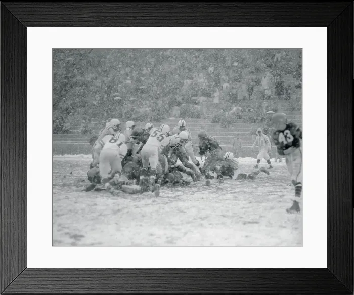 Framed Print : Football Players Tackling Their Opponents Framed Print : Football Players Tackling Their Opponents