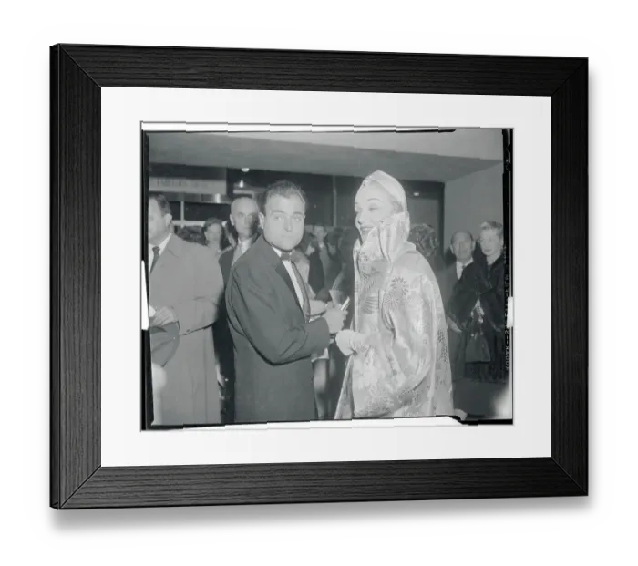 Framed Print : Marlene Dietrich and Mike Todd Pausing During Premiere