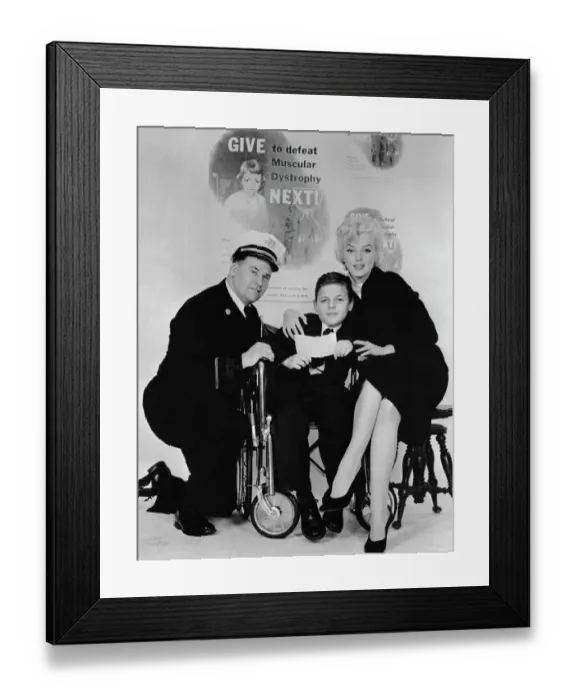 Framed Print : Marilyn Monroe Sitting with Muscular Dystrophy Sufferer