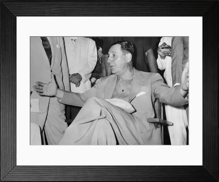Framed Print : Juan Person Talking to Newsmen