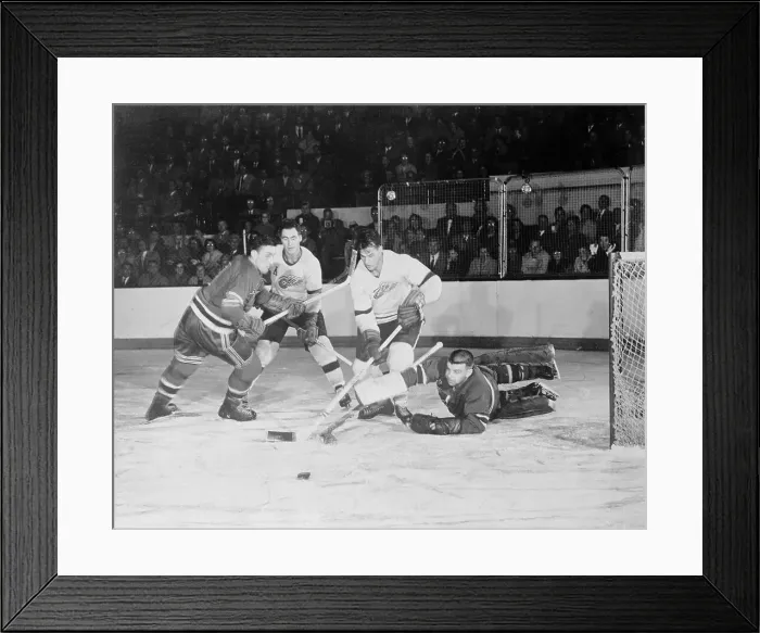 Framed Print : Lorne Worsley Defecting a Puck Framed Print : Lorne Worsley Defecting a Puck