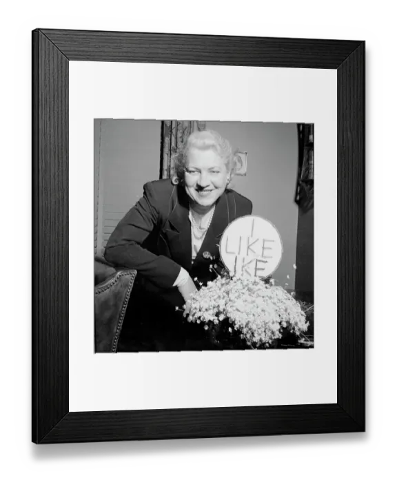 Framed Print : Jacqueline Cochran Standing with Flower Arrangement Framed Print : Jacqueline Cochran Standing with Flower Arrangement