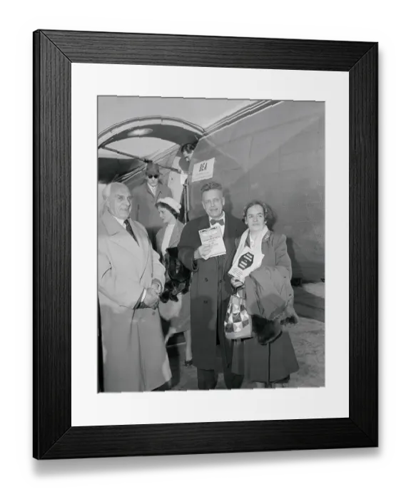 Framed Print : Doctor Alfred Kinsey and his wife Holding up Book