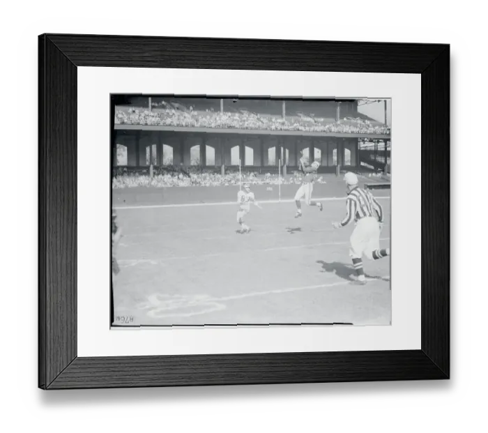 Framed Print : Football Player Intercepting a Pass
