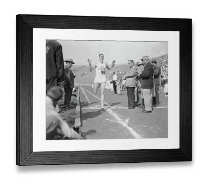 Framed Print : View of Wes Santee Winning Race