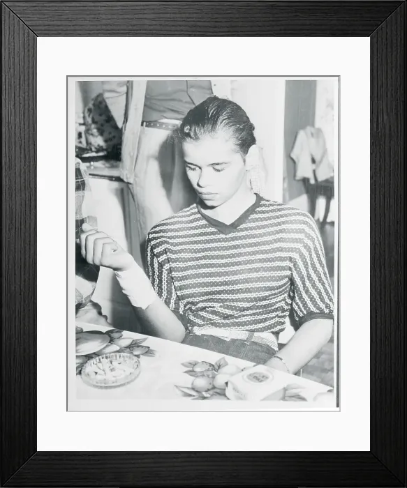 Framed Print : Woman Looking at Her Bandaged Wrist Framed Print : Woman Looking at Her Bandaged Wrist