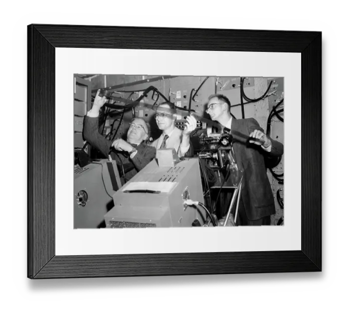 Framed Print : Physicists Looking at Record Beams Framed Print : Physicists Looking at Record Beams