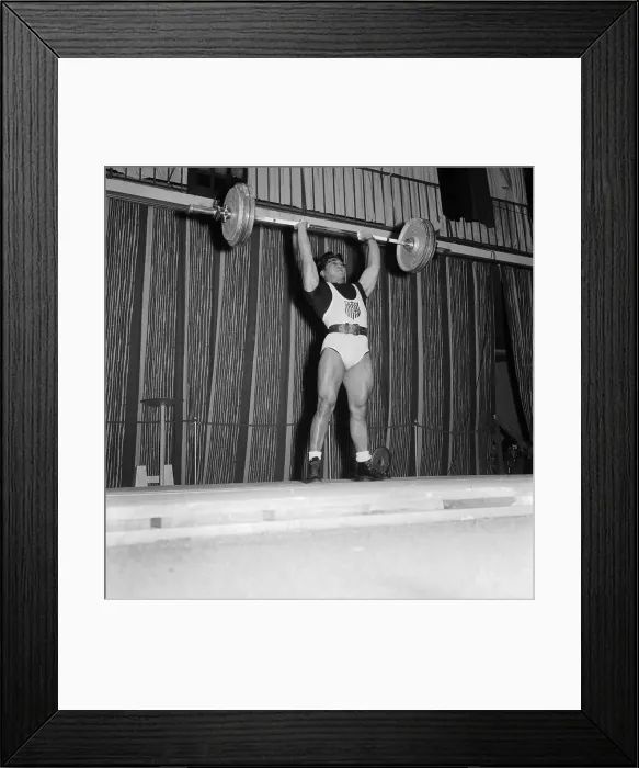 Framed Print : Man Lifting a Barbell Framed Print : Man Lifting a Barbell