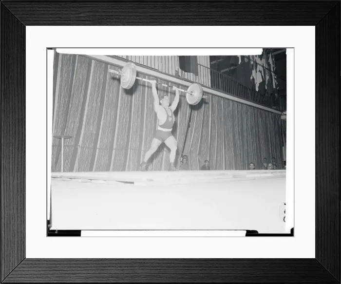 Framed Print : Man Lifting a Barbell Framed Print : Man Lifting a Barbell