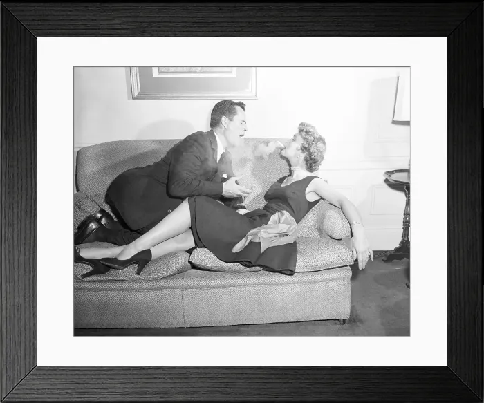 Framed Print : Betty Garrett Exhaling Smoke onto Her Husband Framed Print : Betty Garrett Exhaling Smoke onto Her Husband