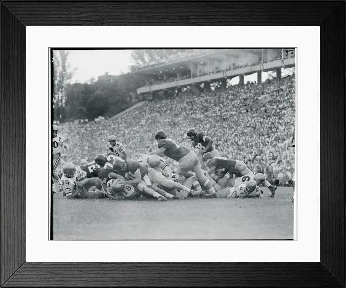 Framed Print : Football Players Piled Atop One Another Framed Print : Football Players Piled Atop One Another