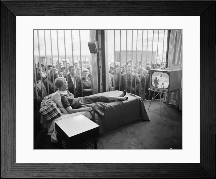 Framed Print : Russel E. Lee Watching TV with World Watching Framed Print : Russel E. Lee Watching TV with World Watching