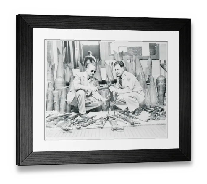 Framed Print : Men Examining Weapons Framed Print : Men Examining Weapons