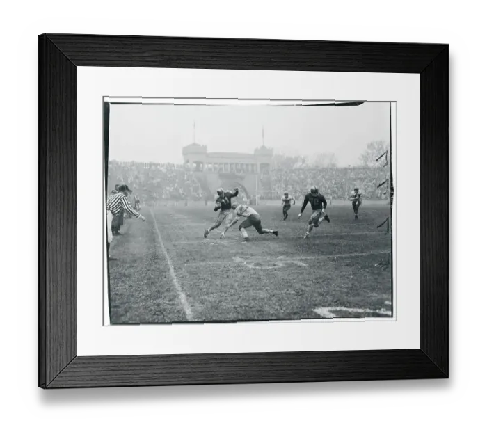 Framed Print : Football Player Tackling His Opponent Framed Print : Football Player Tackling His Opponent