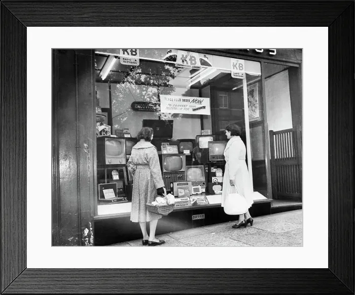 Framed Print : Women Looking at Televisions in Store Window Framed Print : Women Looking at Televisions in Store Window
