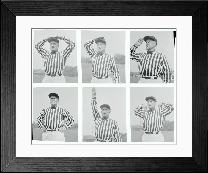 Framed Print : Football Referee Demonstrating Hand Signals Framed Print : Football Referee Demonstrating Hand Signals