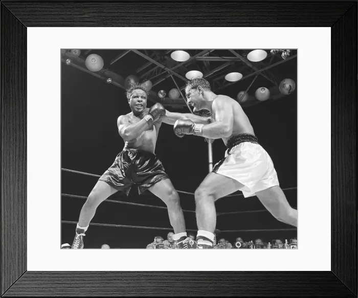 Framed Print : Archie Moore Punching Rocky Marciano Framed Print : Archie Moore Punching Rocky Marciano