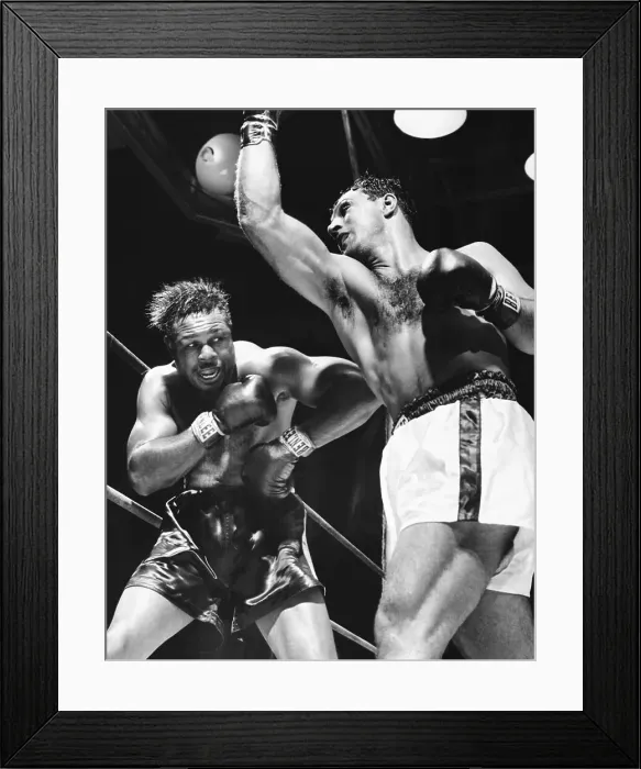 Framed Print : Rocky Marciano Missing with Wild Uppercut