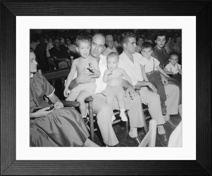 Framed Print : Defendants Holding Their Children During a Trial