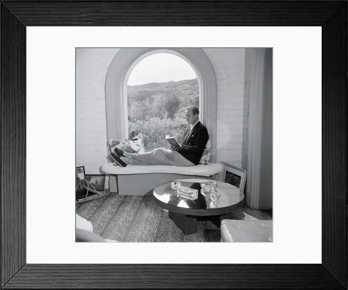 Framed Print : David Niven Reading Framed Print : David Niven Reading