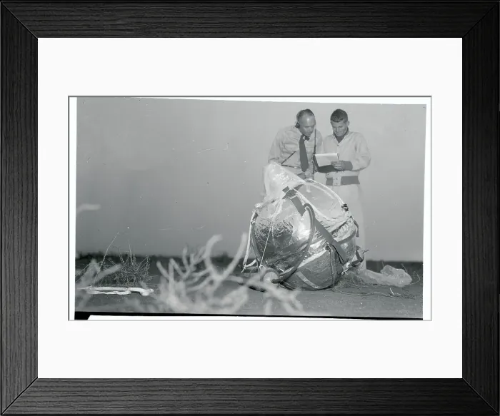 Framed Print : Scientists Checking a Plastic Balloon Framed Print : Scientists Checking a Plastic Balloon