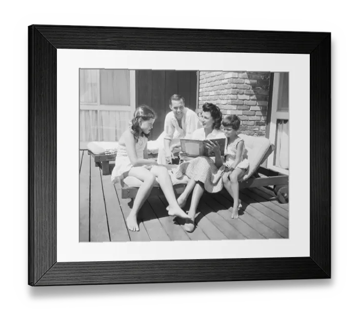 Framed Print : Rita Hayworth Reading Book to Her Daughters Framed Print : Rita Hayworth Reading Book to Her Daughters