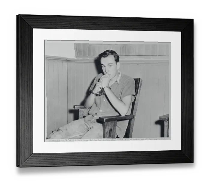 Framed Print : Young Suspect Pensively Reclining at Station Framed Print : Young Suspect Pensively Reclining at Station
