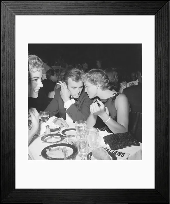 Framed Print : James Dean Seated at Dinner with Ursula Andress Framed Print : James Dean Seated at Dinner with Ursula Andress