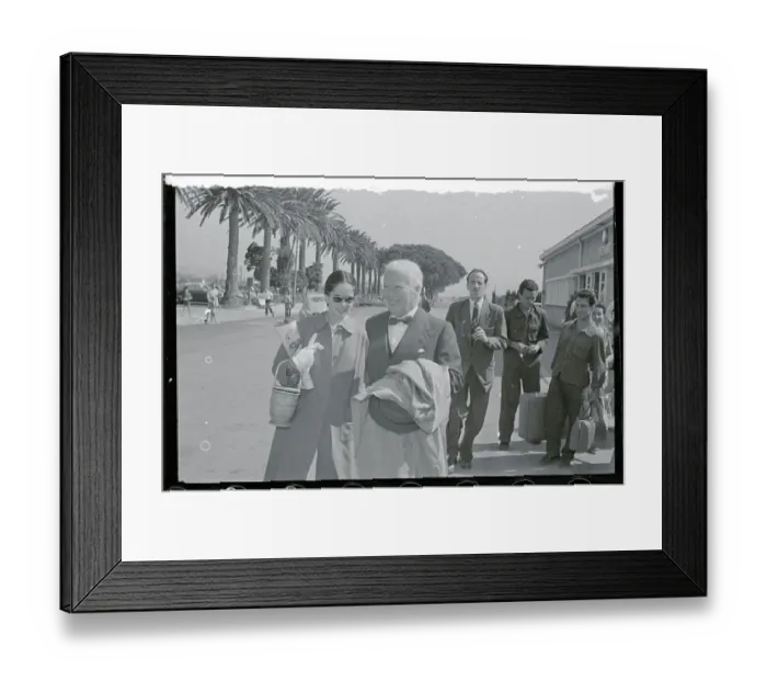 Framed Print : Charles Chaplin Strolling with His Wife Framed Print : Charles Chaplin Strolling with His Wife