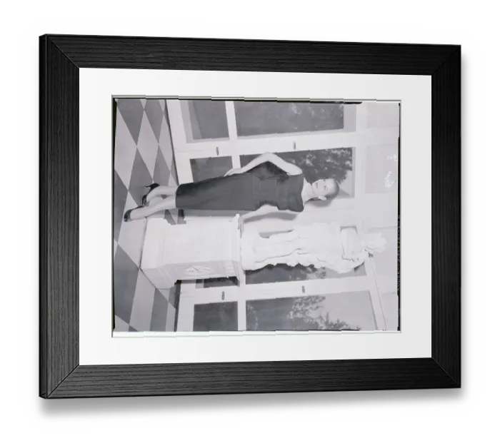 Framed Print : Model Posing by Large Statue Framed Print : Model Posing by Large Statue