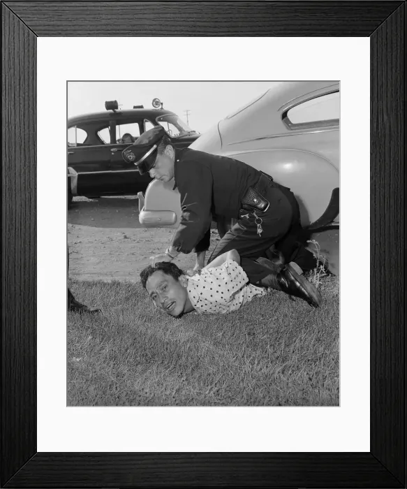 Framed Print : Policeman Restraining Suspect Framed Print : Policeman Restraining Suspect