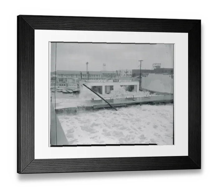 Framed Print : Waves Crashing Against a Small Beach Restaurant