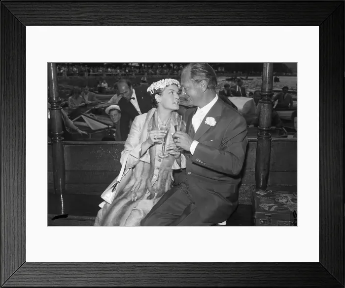 Framed Print : Eva Bartok and Curd Juergens Toasting to Each Other