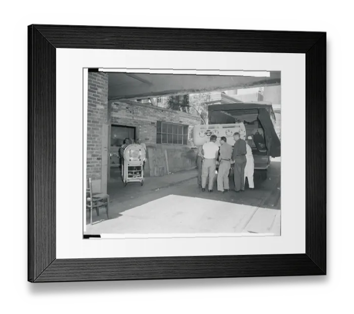 Framed Print : Workers Removing Hospital Machinery