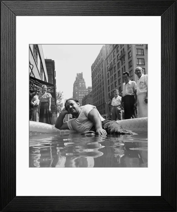 Framed Print : Man Relaxing in a Small Pool Framed Print : Man Relaxing in a Small Pool