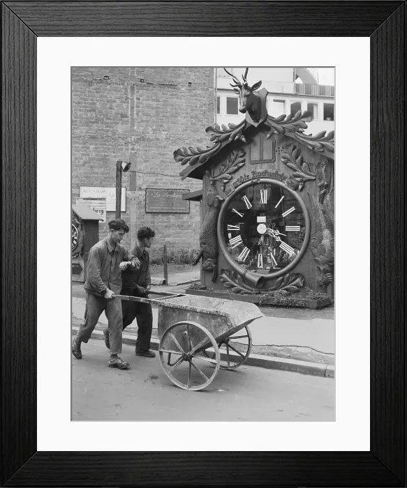 Framed Print : Man Checking Time by Large Clock Framed Print : Man Checking Time by Large Clock