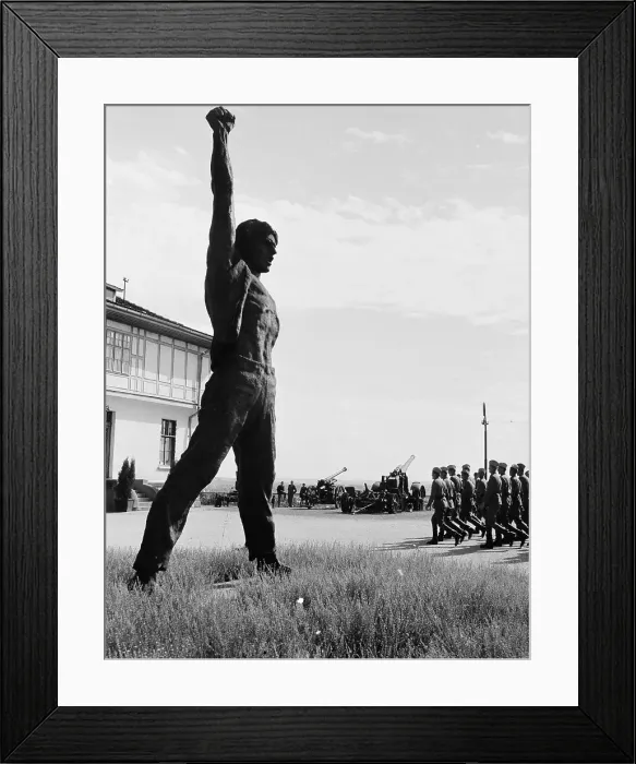 Framed Print : Soldiers Marching Past a Bronze Statue Framed Print : Soldiers Marching Past a Bronze Statue