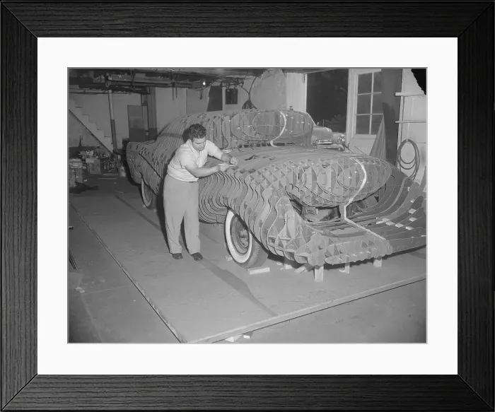 Framed Print : Man Building a Sports Car Prototype Model Framed Print : Man Building a Sports Car Prototype Model