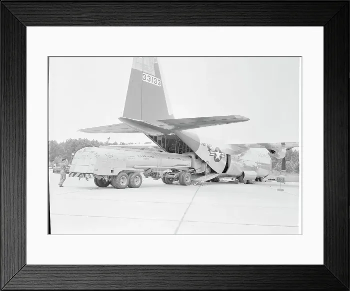 Framed Print : Fuel Truck Being Loaded into USAF Hercules Airplane Framed Print : Fuel Truck Being Loaded into USAF Hercules Airplane